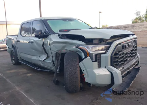 2022 Toyota Tundra Hybrid Trd Pro из США, поврежденный, VIN 5TFPC5DB7NX011817